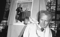 Paul Newman sits before a spaghetti dinner made with his own spaghetti sauce, “Newman’s Own Industrial Spaghetti Sauce,” May 19, 1983, in New York. (Carlos Perez / AP Photo)