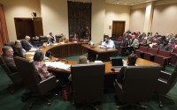 Nebraska state Sen. Justin Wayne (center) speaks on behalf of LB20, a bill he introduced, during a hearing before the Government, Military and Veterans Affairs Committee on Feb. 22, 2023, at the Nebraska State Capitol in Lincoln, Neb. 
(Rebecca S. Gratz / AP Photo