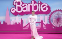 Margot Robbie poses for photographers upon arrival at the premiere of the film 'Barbie' on Wednesday, July 12, 2023, in London. 
(Scott Garfitt / Invision / AP Photo)