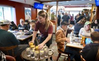 Waitress Rachel Gurcik serves customers at the Gateway Diner in Westville, Pa. on Oct. 22, 2023. On Friday, April 5, 2024, the U.S. government issues its March jobs report. 
(Tom Gralish / The Philadelphia Inquirer via AP)