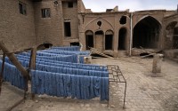 Batches of thread for hand-woven carpets that have been dyed are left to dry in the sun at a workshop at the traditional bazaar of the city of Kashan, about 152 miles (245 km) south of the capital Tehran, Iran, Tuesday,  April 30,  2024. 
(Vahid Salemi / AP Photo)
