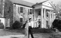 Elvis Presley with his girlfriend Yvonne Lime are photographed at his home, Graceland, in Memphis, Tenn., around 1957. A mysterious company has caused a stir for trying to auction Elvis Presley's Graceland in a foreclosure sale this week. A judge has blocked the sale after Presley's granddaughter filed a lawsuit alleging fraud. 
(AP Photo)