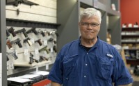 Maxon Shooter's Supplies owner Dan Eldridge poses in his store in Des Plaines, Ill., Tuesday, June 25, 2024. 
(Teresa Crawford / AP Photo)