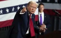 Former President Donald Trump gestures at a campaign rally Wednesday, July 24, 2024, in Charlotte, N.C. 
(Alex Brandon / AP Photo)