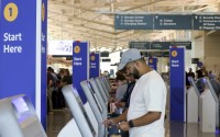 A passenger checks in for his Southwest Airlines flight at Midway International Airport in Chicago, Thursday, July 25, 2024. 
(Teresa Crawford / AP Photo)