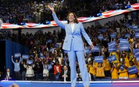 Vice President Kamala Harris waves during a campaign rally, Tuesday, July 30, 2024, in Atlanta. 
(John Bazemore / AP Photo)