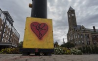 An image of a broken heart is fixed across the street from City Hall with the Heritage Center of Clark County (right) Tuesday, Sept. 17, 2024, in Springfield, Ohio. 
(Carolyn Kaster / AP Photo)