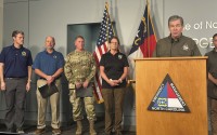 North Carolina Gov. Roy Cooper (at podium), speaks during a media briefing on the government response to Hurricane Helene in western North Carolina while Federal Emergency Management Agency Administrator Deanne Criswell (center) and others listen at the state Emergency Operations Center in Raleigh, N.C., Tuesday, Oct. 1, 2024. 
(Gary D. Robertson / AP Photo)