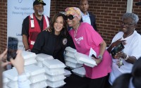 Democratic presidential nominee Vice President Kamala Harris poses for a photo as she helps distribute food with the American Red Cross at the Henry Brigham Community Center in Augusta, Ga., Wednesday, Oct. 2, 2024. 
(Carolyn Kaster / AP Photo)
