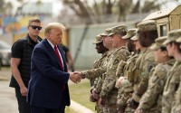 Republican presidential candidate former President Donald Trump greets members of the National Guard on the U.S.-Mexico border, Feb. 29, 2024, in Eagle Pass, Texas. 
(Eric Gay / AP Photo)