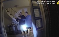 In this image taken from San Francisco Police Department body camera video, the husband of former U.S. House Speaker Nancy Pelosi, Paul Pelosi (right) fights for control of a hammer with his assailant, David DePape, during a brutal attack in the couple's San Francisco home on Oct. 28, 2022. 
(San Francisco Police Department via AP)