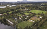 Small ancestral floating gardens are visible next to new soccer fields on the Xochimilco Lake in the Xochimilco borough of Mexico City, on Sunday, Oct. 20, 2024. 
(Felix Marquez / AP Photo)