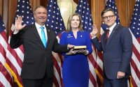 House Speaker Mike Johnson, R-La. (right) poses during a ceremonial swearing-in with Rep. Don Bacon, R-Neb. (left) in the Rayburn Room at the Capitol in Washington, Friday, Jan. 3, 2025. 
(Mark Schiefelbein / AP Photo)