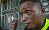 Ateasong Belts Tajoah shows a bullet scar on his neck during an interview with The Associated Press in Dschang, Cameroon, Friday, Dec. 1, 2024. 
(Robert Bociaga / AP Photo)