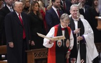 President Donald Trump (left) watches as Rev. Mariann Budde (second from right) arrives at the national prayer service at the Washington National Cathedral, Tuesday, Jan. 21, 2025, in Washington.
 (Evan Vucci / AP Photo)