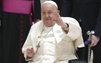 Pope Francis waves as he arrives for his weekly general audience in the Paul VI Hall, at the Vatican, Wednesday, Feb. 12, 2025. 
(Alessandra Tarantino / AP Photo)
