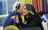 President Donald Trump congratulates Tulsi Gabbard after she was sworn in as the Director of National Intelligence in the Oval Office of the White House, Wednesday, Feb. 12, 2025, in Washington. 
(Alex Brandon / AP Photo)