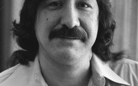 Native American activist Leonard Peltier sits for a portrait in prison in February 1986. 
(Cliff Schiappa / AP Photo)