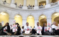 Demonstrators protest against cuts to American foreign aid spending, including USAID and the PEPFAR program to combat HIV/AIDS, at the Cannon House Office Building on Capitol Hill, Wednesday, Feb. 26, 2025, in Washington. 
(Mark Schiefelbein / AP Photo)