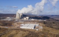 A data center owned by Amazon Web Services (front right) is under construction next to the Susquehanna nuclear power plant in Berwick, Pa., on Tuesday, Jan. 14, 2024. 
(Ted Shaffrey / AP Photo)