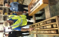 NioCorp Corporate Controller Jeff Mason shows investors core samples the mining company has collected while NioCorp CEO Mark Smith (right) listens, Oct. 6, 2021 in Elk Creek, Neb. 
(Josh Funk / AP Photo)