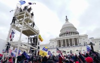 Trump supporters gather outside the Capitol, Jan. 6, 2021, in Washington. 
(John Minchillo / AP Photo)