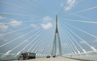 A semitrailer crosses the Gordie Howe International Bridge between Detroit, Mich. and Windsor, Ontario on its opening day, Monday, July 27 2026. 
(Jacob Hamilton / Ann Arbor News via AP)