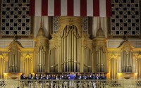 Members of the Girard Academic Music Program perform at Macy's on Saturday, June 14, 2014, in Philadelphia. Macy's and the Smithsonian Museum salutes the 200th anniversary of the Star-Spangled Banner with a special performance by The Girard Academic Music Program along with Grand Court Organist, Peter Richard Conte on the Wanamaker organ. 
(Michael  Perez / AP Images for Macy's)