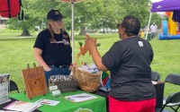 No More Empty Pots showcases its programs at a community event in North Omaha.
(Courtesy of No More Empty Pots)