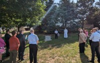 A group of current and former FBI agents laid a wreath Tuesday at the grave of a fellow agent gunned down in the Kansas City Massacre 90 years ago. (Courtesy of the Omaha Office of the FBI)