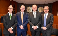 An oath of office and robing ceremony was held for Hon. Beau G. Finley, the newly appointed county court judge for Nebraska’s Fourth Judicial District, last Friday at the Omaha-Douglas Civic Center. Among those attending were (left to right) Attorney Peder Bartling; Hon. Matthew Kahler, Douglas County Juvenile Court; Hon. Beau G. Finley; and Attorney Kevin Ryan.
