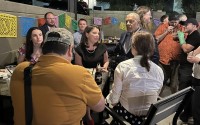 Democratic candidate for Congress in Nebraska’s 2nd Congressional District Crystal Rhoades speaks with supporters at her watch party at Primo’s Mexican Restaurant in Omaha. 
(Erin Bamer / Nebraska Examiner)