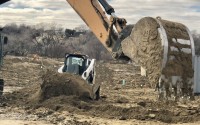 Construction crews prepare the 15-acre site in the Elkhorn area for the mixed-income Capriana neighborhood, which will switch things up: the affordable component will be the single-family homeownership options and the apartments will be market rate rentals. 
(Cindy Gonzalez / Nebraska Examiner)