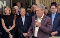 Nebraska Gov. Jim Pillen applauds U.S. Rep. Don Bacon, R-Neb., for his service to Nebraska’s 2nd Congressional District on Wednesday in Omaha. 
(Aaron Sanderford / Nebraska Examiner)