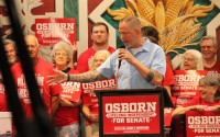 Registered nonpartisan U.S. Senate candidate Dan Osborn speaking in Lincoln on June 11, 2026. 
(Juan Salinas II / Nebraska Examiner)