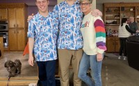 Max Perry (left) with parents Mitch and Nikki. The photo represents “a big win for the team,” Nikki said, as it was a rare time when they were able to plan and attend a family get-together for a short while. 
(Courtesy of Perry family)