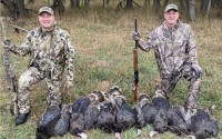 U.S. Sen. Pete Ricketts (at left) then Nebraska’s governor, celebrates his hunt near Chadron in 2022 with State Sen. Myron Dorn of Adams. Ricketts has now bought land in the area. 
(Courtesy of Nebraska Governor’s Office)