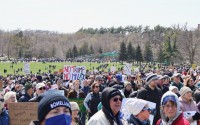 Protesters gather in central Omaha’s Memorial Park, across Dodge Street from the University of Nebraska at Omaha, on Saturday, April 5, 2025. 
(Courtesy of Lucy Mason / The Gateway)
