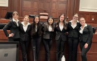 Team coach Mark Laughlin captured this moment prior to the seven talented students learning that their trial verdict was affirmed and being announced as state champions.
(Courtesy of Mark Laughlin)