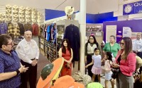 Mayor of Zacapu, Mexico, Mónica Valdez Pulido (in pink jacket on right), tours South Omaha and its Plaza Latina store on the 24th Street commercial corridor, during a visit last week to Nebraska, which marked a donation and new alliance between Columbus, Nebraska, and Zacapu. 
(Courtesy of Plaza Latina)
