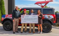 Pictured from left to right: Bill Black, Scooter’s Coffee Chief Marketing Officer; Colonel John D. Folsom, Wounded Warriors Family Support Founder and President Emeritus; Joe Thornton, Scooter’s Coffee President; Kate McCauley, Wounded Warriors Family Support CEO and President. (Courtesy of Scooter’s Coffee)