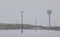 The former Cabela’s World Headquarters pictured in Sidney during a March snowstorm. Nearly 550,000 square feet of office space sits nearly empty on the site. Local leaders have tried and failed to lure a major company to the site. Experts say that may be for the best, arguing the town should continue to diversify its economy instead. (Fletcher Halfaker / Flatwater Free Press) 