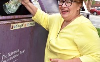 Sue Boyd, an avid recycler, deposits her bottles at one of the eight locations that accept glass from Omaha residents throughout the metro area.
(Carla Chance / The Daily Record)