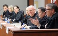 Above, Nebraska Supreme Court justices answer questions from Creighton University School of Law students following an oral argument session held in the Gross Appellate Courtroom at Creighton on March 5, 2020. (Photo by Scott Stewart)
