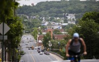 A cyclist pedals up a hill in Allentown, Pa., Friday, May 29, 2020. Allentown predicts a budget deficit of over $10 million, a number officials say could go higher if the economy doesn’t rebound quickly. (AP)