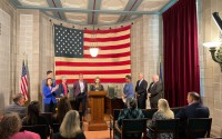 State Sen. Anna Wishart, Gov. Jim Pillen and others at a press conference last year discussing the legislation that creates the new community clinics.
 (Courtesy of Governor’s Office)