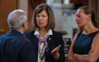 State Sen. Teresa Ibach of Sumner (center) talks with State Sen. Steve Erdman of Bayard and State Sen. Danielle Conrad of Lincoln. 
(Zach Wendling / Nebraska Examiner)