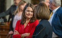 State Sen. Kathleen Kauth of the Millard area (left) talks with State Sen. Teresa Ibach of Sumner, Jan. 8, 2025. 
(Zach Wendling / Nebraska Examiner)