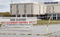 Martin County General Hospital in Williamston, N.C., sits abandoned in April 2024 after being closed in August 2023. Hospital leaders are consulting with state and federal officials about the possibility of reopening it as a rural emergency hospital. It would be the first hospital in the country to shut down and then reopen under the rural emergency hospital designation. 
(Karl B DeBlaker / The Associated Press)