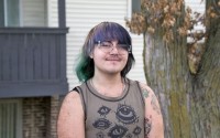 Spencer Antrim worked with volunteers from Omaha Tenants United to organize residents of Camelot Village Apartments into a union. The 21-year-old California native has experienced major maintenance issues since he arrived at the central Omaha complex. 
(Jeremy Turley / Flatwater Free Press)